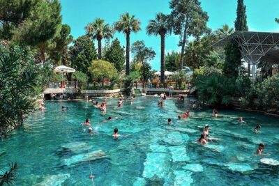 Pamukkale Small Group Tour From Kusadasi or Selcuk Hotels - Pamukkale travertines: white terraces, hot-spring water, and classic photos